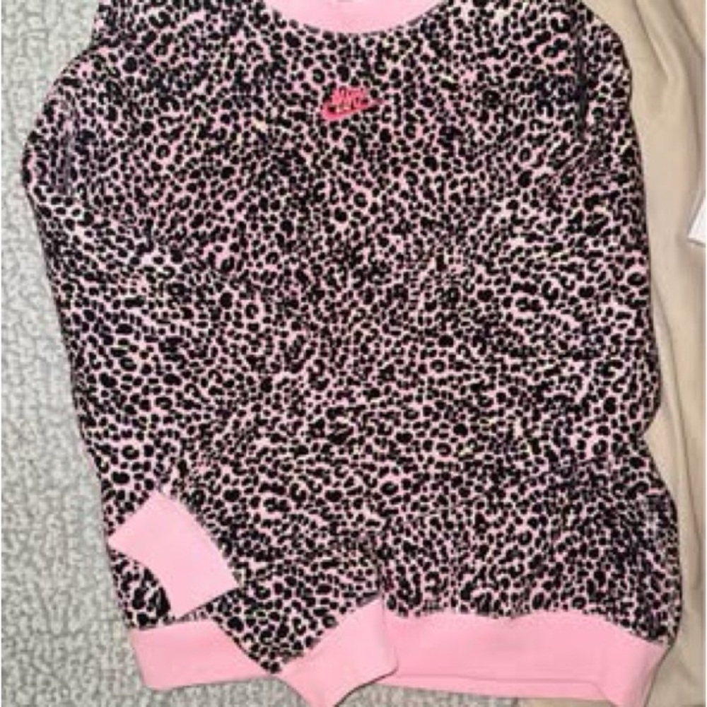 Worn once no longer sold Nike Crewneck;soft, comfy, stretchy & warm. Can fit S-L